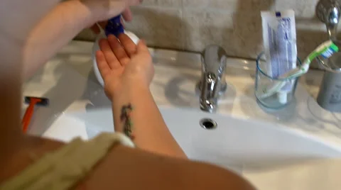 Young Woman Washing Her Hands With Liquid Soap, Overd The Shoulder Shot Stock Footage
