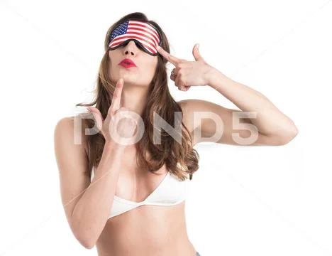 Young woman wearing eyemask. American Dream concept. Isolated on white backgr Stock Photos