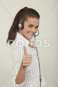 Young Woman Wearing Headphones, Portrait