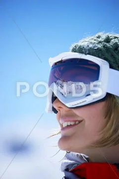 Young Woman Wearing Ski Goggles