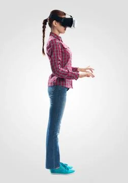 Young woman wearing VR goggles Stock Photos