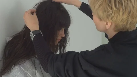 Young woman while styling Stock Footage 73071264