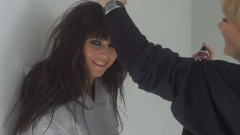 Young woman while styling Stock Footage 73071318