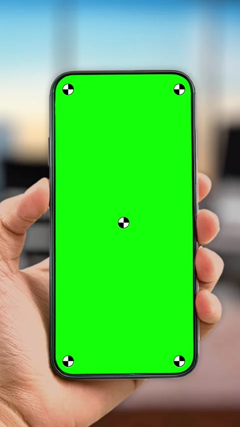 Young woman in work office using smartphone with green mock up screen chroma key Stock Footage 306171929
