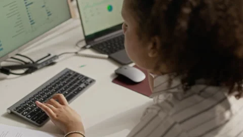 Young Woman Working on Computer during Hot Day Stock Footage 335466359