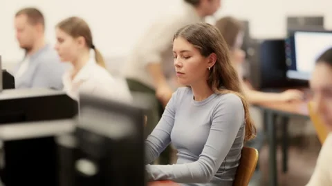 Young woman working on computer in office Stock Footage 341380061