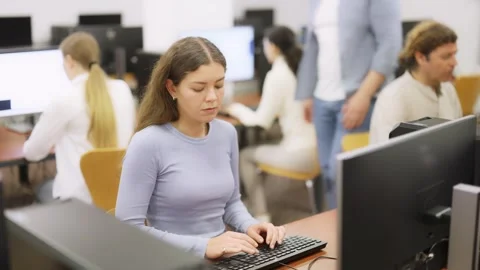 Young woman working on computer in office Stock Footage 342131261