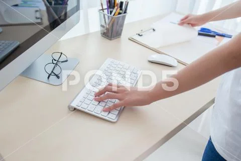 Young woman working in office Stock Photos