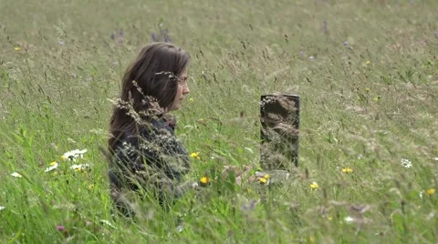 Young woman working at tablet in spring nature 4k Stock-Footage 46207400