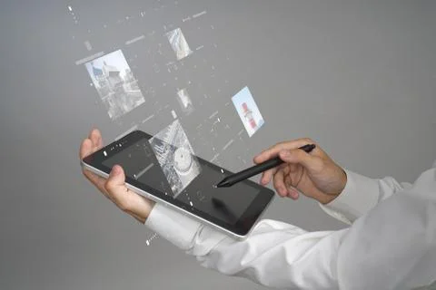Young woman working with virtual interface. Engineer-technologist. Stock Photos