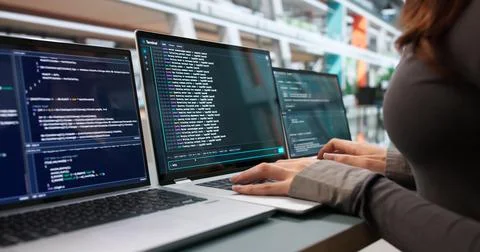 Young Woman Writes Code Using Cloud-based Online Interactive Editor. Photos