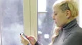 young woman writes a sms HD Footage