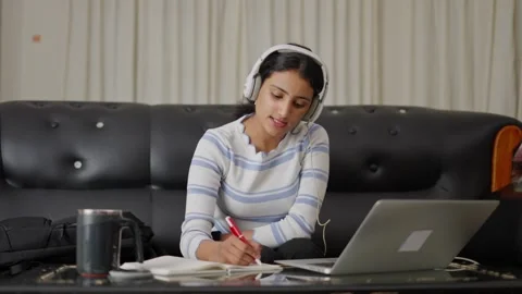 Young Woman writing down the notes from tutor, New trine making notes Stock Footage 251662029