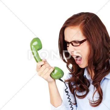 Young woman yelling at a telephone Stock Photos