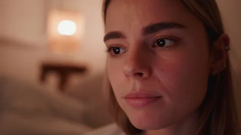 Young Woman's Focused Gaze on a Digital Screen Stock Footage 337107860