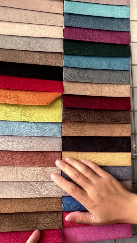 Young Woman's Hand Choosing Fabric Material Color For Interior Use-1 Stock Footage 344676571