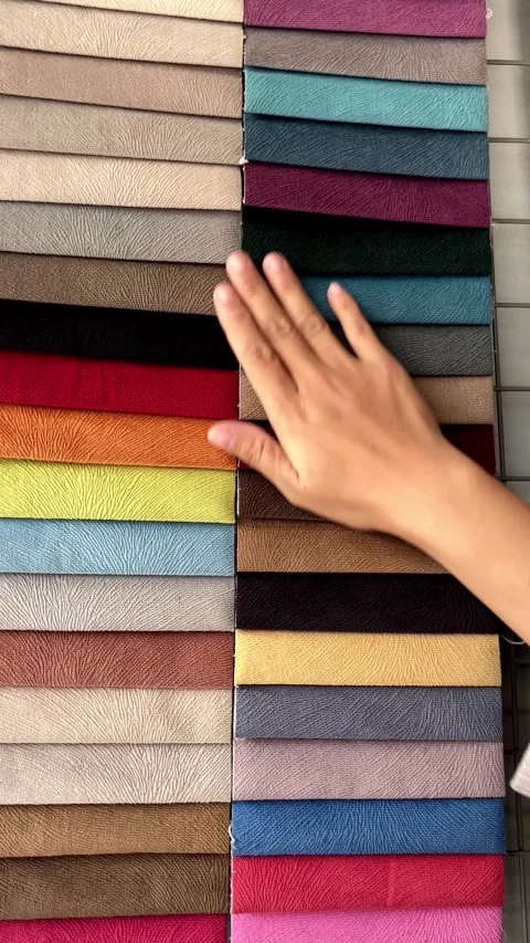 Young Woman's Hand Choosing Fabric Material Color For Interior Use Stock Footage 344677022