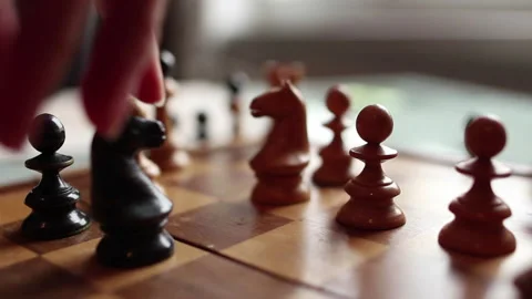 Young woman’s hand moving chess piece Stock Footage 164147615