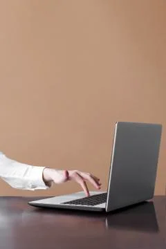 Young womans hand typing Stock Photos