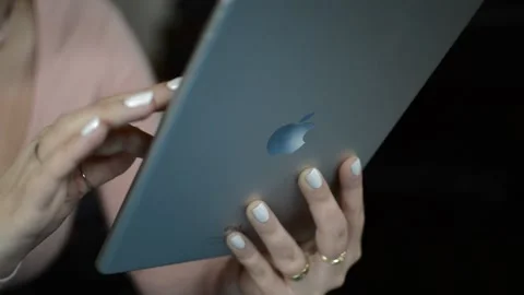 Young woman's hand using i pad hi-tech tablet. i pad communication monitor Stock-Footage 191569314