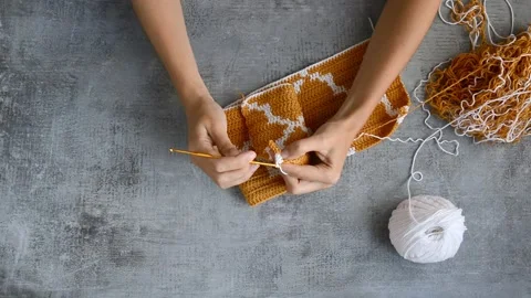 Young womans hands crocheting Stock Footage 141175925