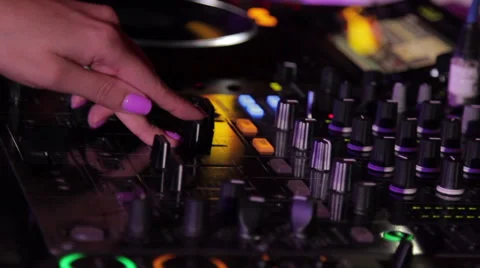 Young woman's hands on the mixtable Stock Footage 52626787