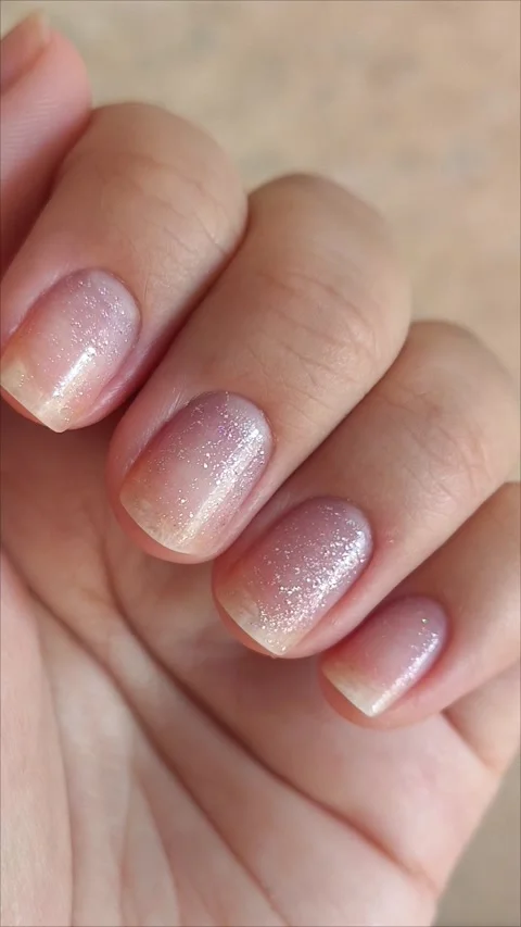 Young womans hands with simple modern creative manicure with show style and Stock Footage 313264967