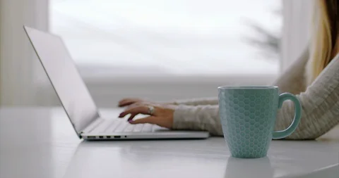 Young womans hands using a laptop. 스톡 동영상 88370251