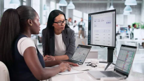 Young Women Focused On Payroll Data Stock Footage 333845017