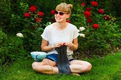 Young wooman with needlework Stock Photos