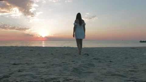 Young woomen on the beach Stock Footage 208659224