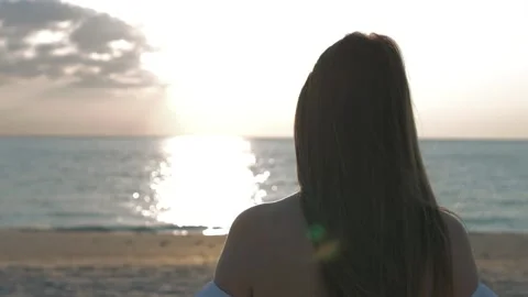 Young woomen on the beach Stock Footage 208659236