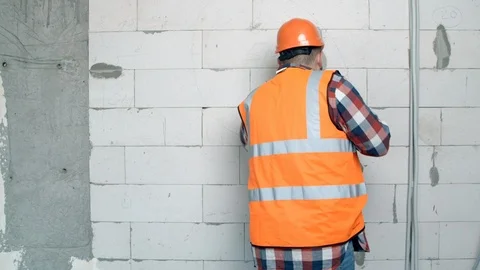 Young worker dancing on construction site Stock Footage 125456847