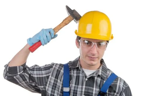 Young worker with a hammer Stock Photos