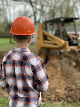 Young Worker overseeing Construction work Stock Photos