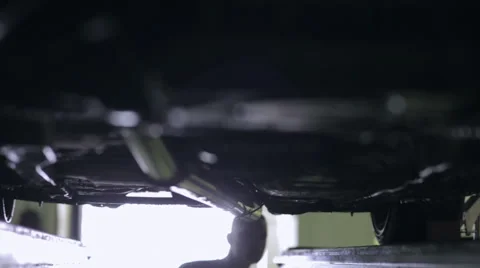 Young worker produces inspection machine Stock Footage