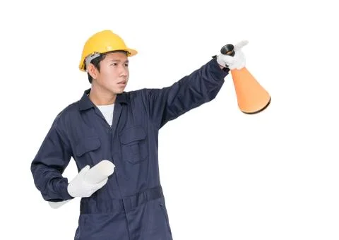 Young worker shouting for announce through a megaphone Foto stock