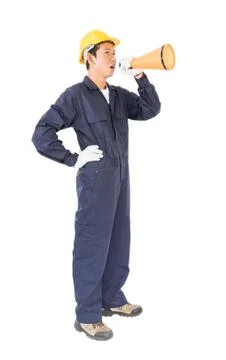 Young worker shouting for announce through a megaphone Stock Photos