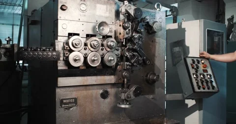 Young worker standing on CNC Stock-Footage 52797262