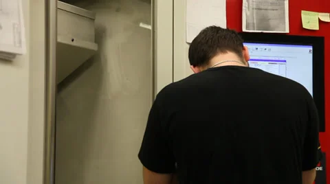 Young worker tuning hadware before a work Stock Footage 36853872