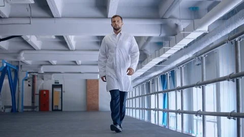 Young worker walks on laboratory Stock Footage 101478989