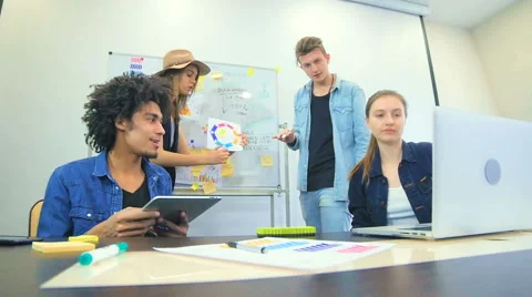 Young workers communicate with the administration on Skype Video stock 60788015