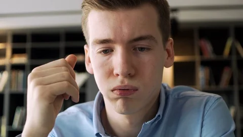 Young working man is very tired and overworked because of stressful and pressure Stock Footage 79931109