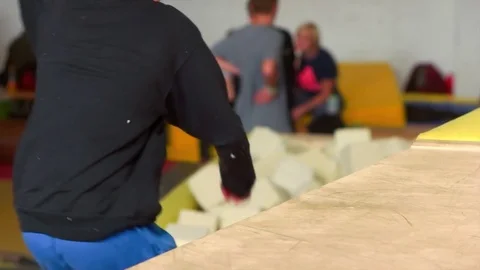 Younger Trying to do Backflip Stock Footage 70529375