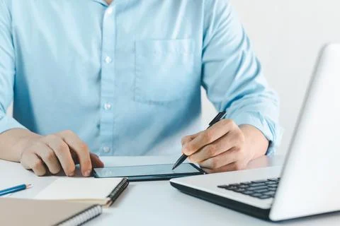 The Youngman hands drawing on a digital tablet on a digital tablet with an el Stock Photos
