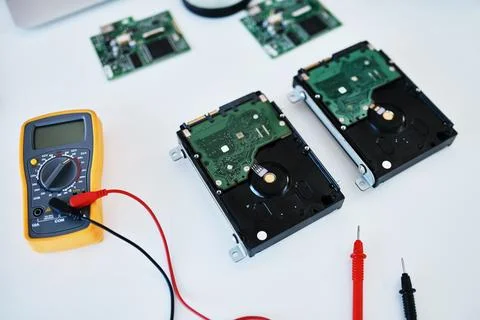Is your companys tech as current as it should be. a multimeter testing the Stock Photos