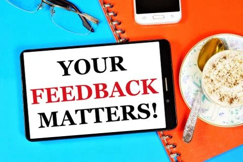 Your feedback is important. Text message on the smartphone screen. Stock Photos