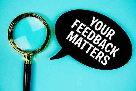 Your Feedback Matters text with speech bubble and magnifying glass on blue .. Stock Photos