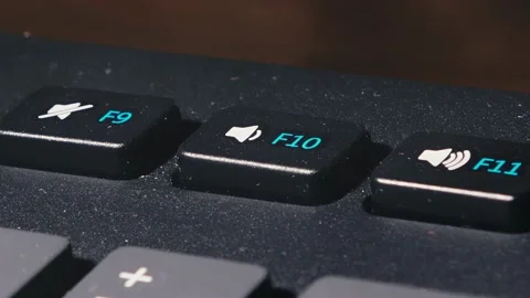Your finger presses the volume down key several times. the user decreases volume Stock Footage 149311841