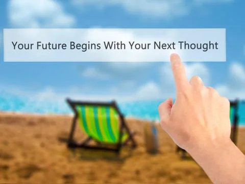 Your Future Begins With Your Next Thought - Hand pressing a button on blurred Stock Photos